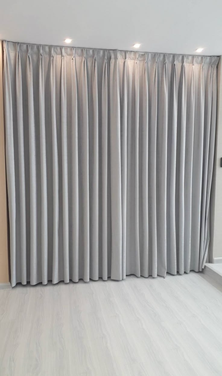 Floor-to-ceiling sheer curtains in a Downtown Dubai apartment