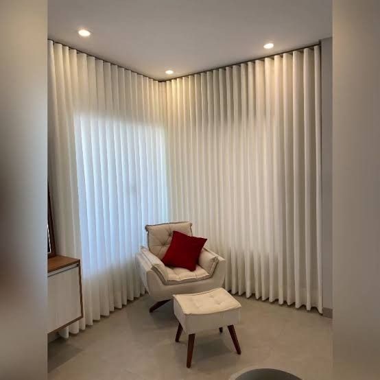 Matte black curtain track and bracket hardware close-up