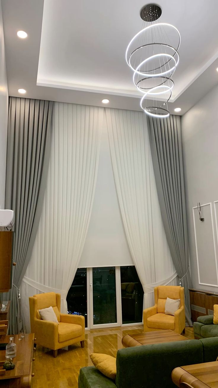 Woven tiebacks and tassel detail on terracotta drapes