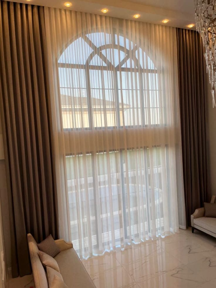 Motorized roller blinds fitted in an Al Barsha family villa